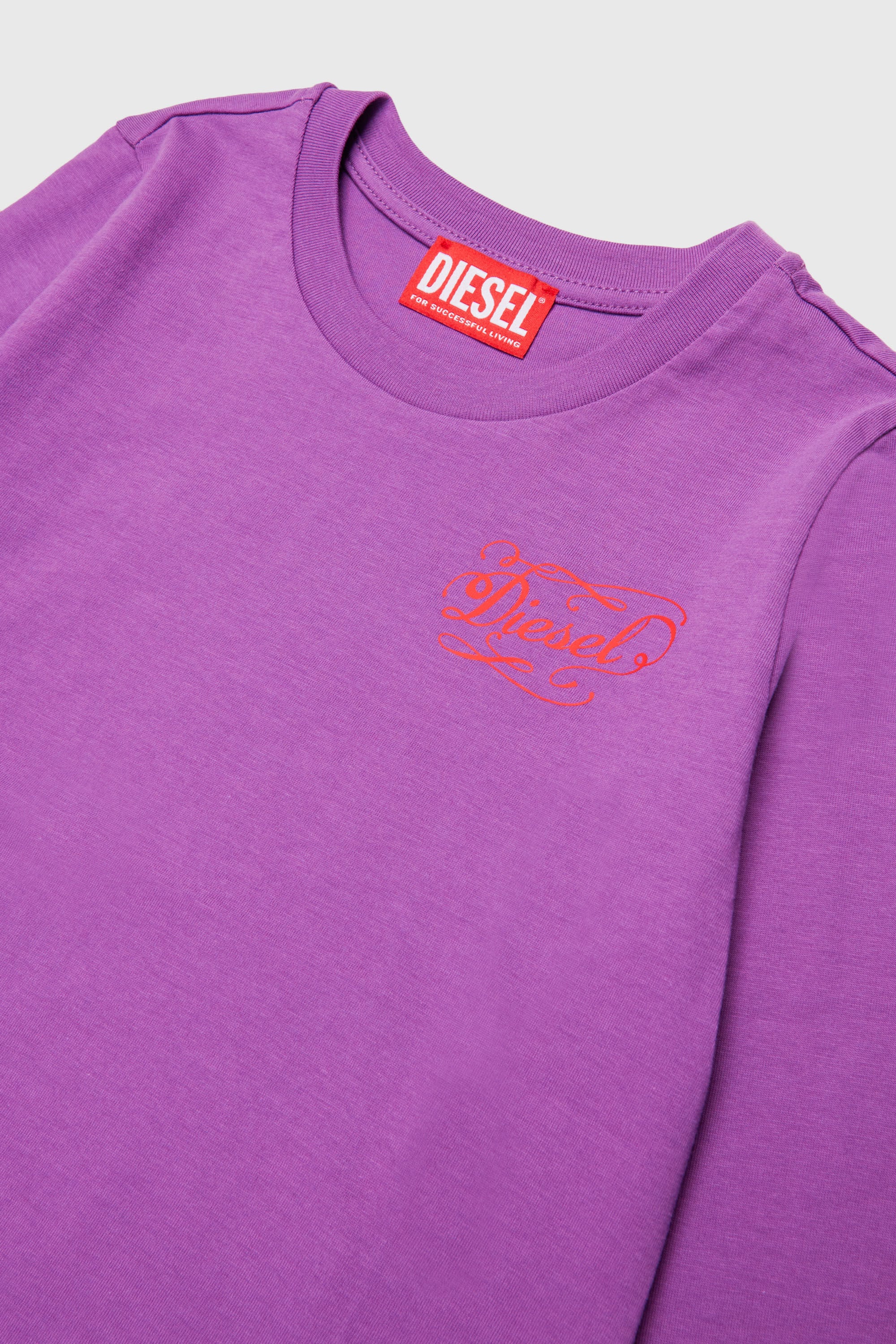 Diesel - TORSY, Damen Langarm-T-Shirt mit verspieltem Logo-Print in Violett - 3