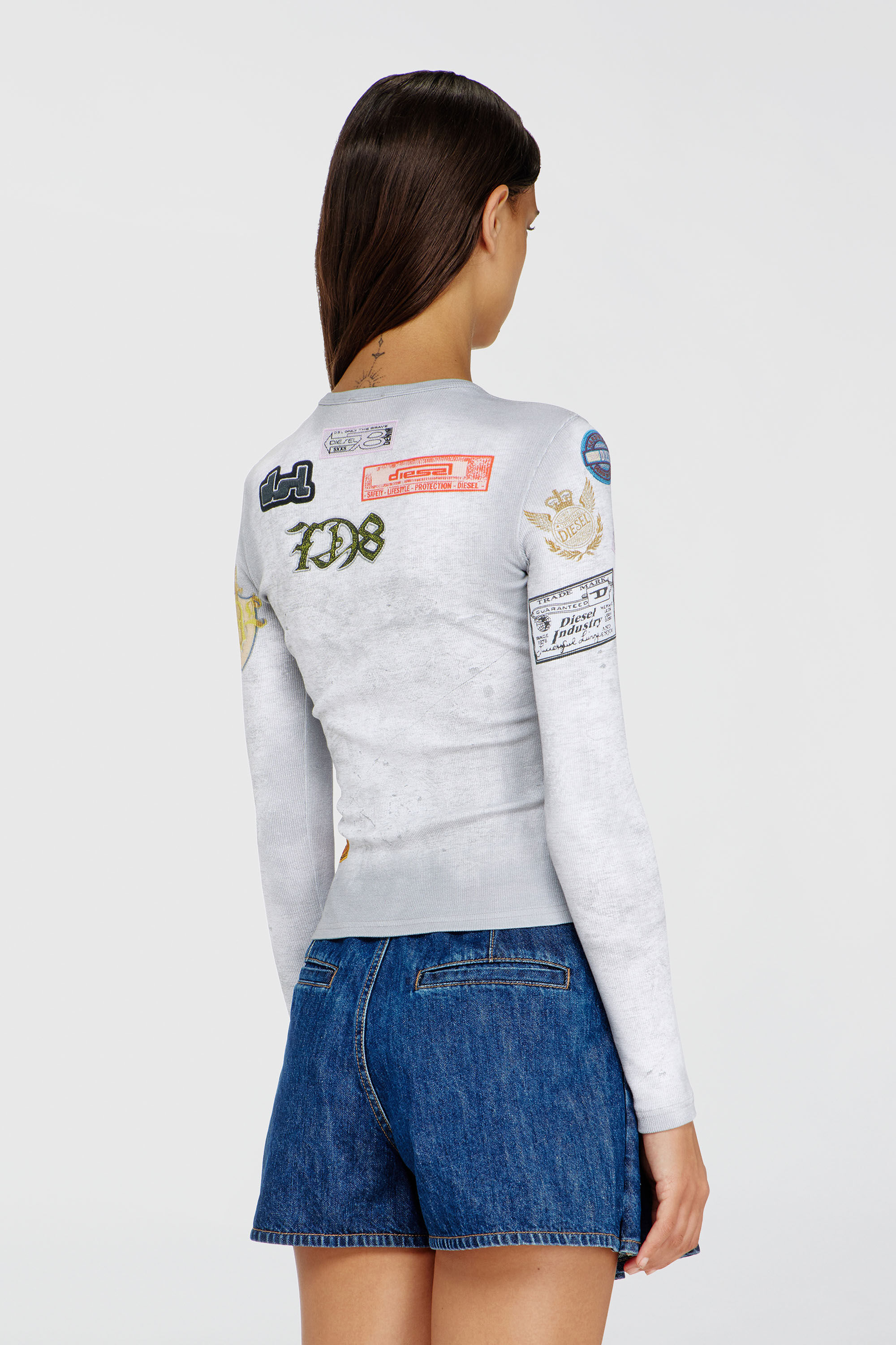Diesel - T-ELE-LONGSLEEVE, Damen Top aus Rippjersey mit all-over Patch-Print in Wei&szlig; - 4