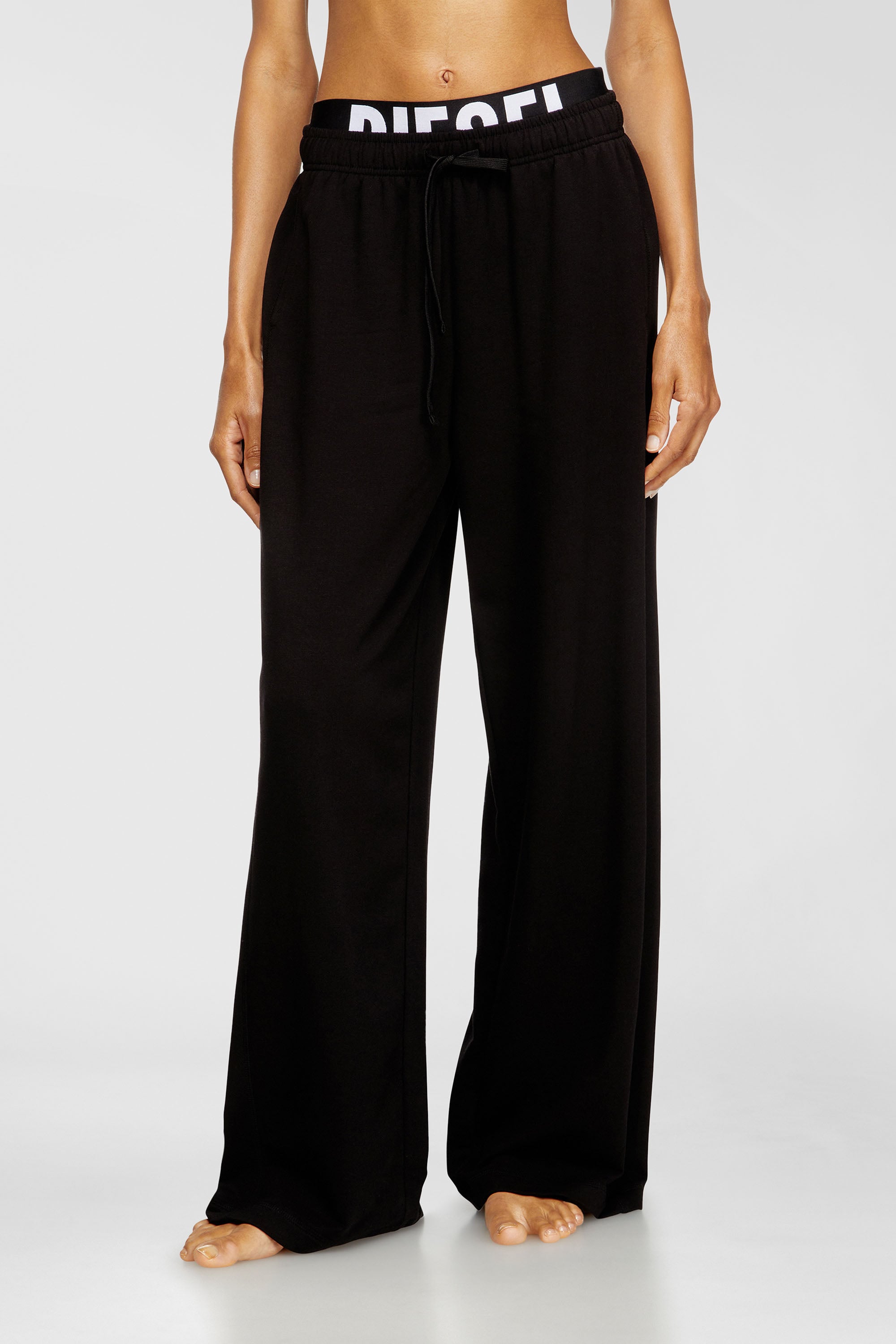 Diesel - LESLIE-D-POP, Damen Jogginghose aus Baumwollfrottee mit Logo-Bund in Schwarz - 1