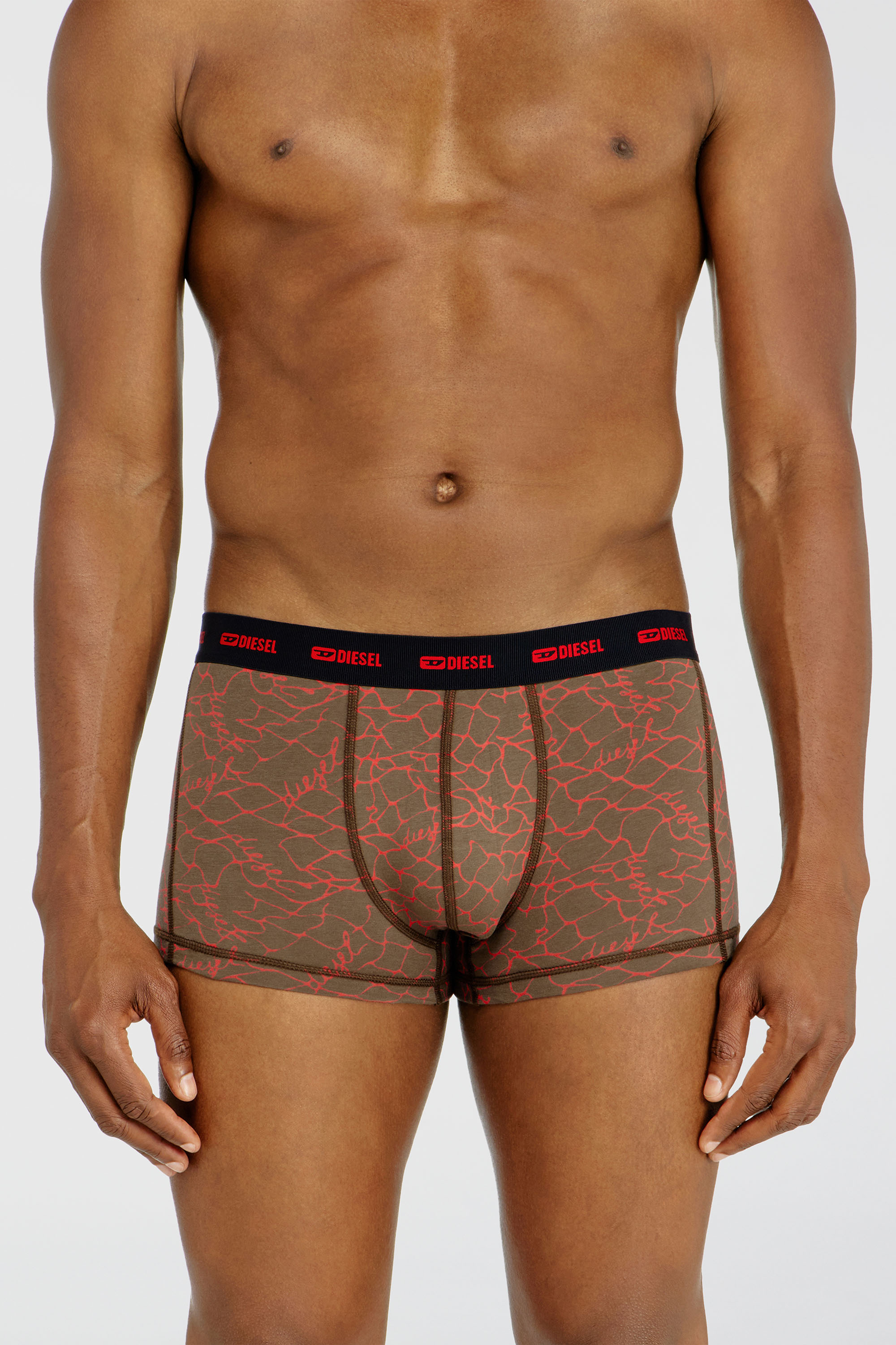Diesel - DAMIEN-UTLT-3PACK, Herren Dreierpack Trunks mit grafischem Motiv in Schwarz/Braun - 2