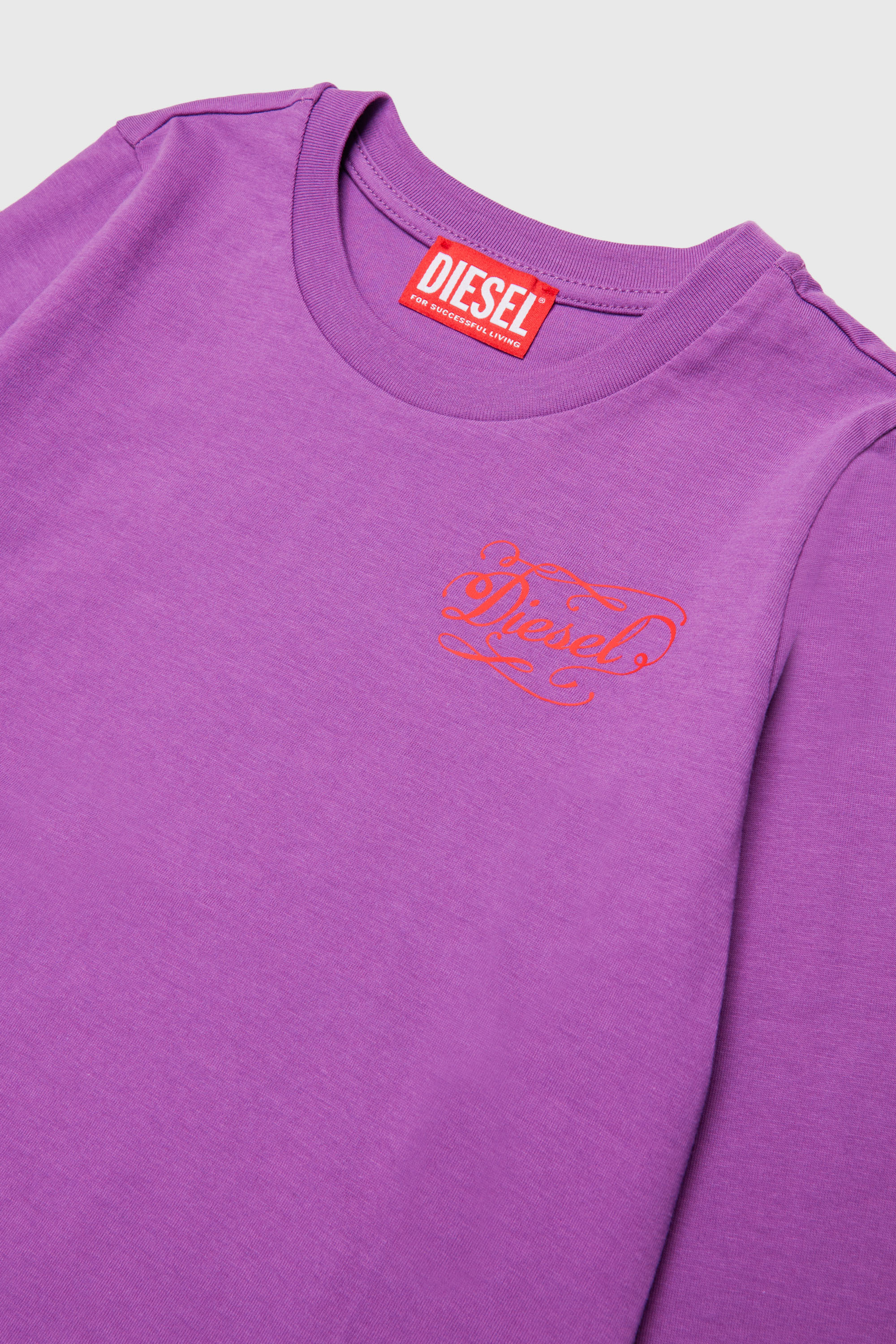 Diesel - TORSY, Damen Langarm-T-Shirt mit verspieltem Logo-Print in Violett - 3