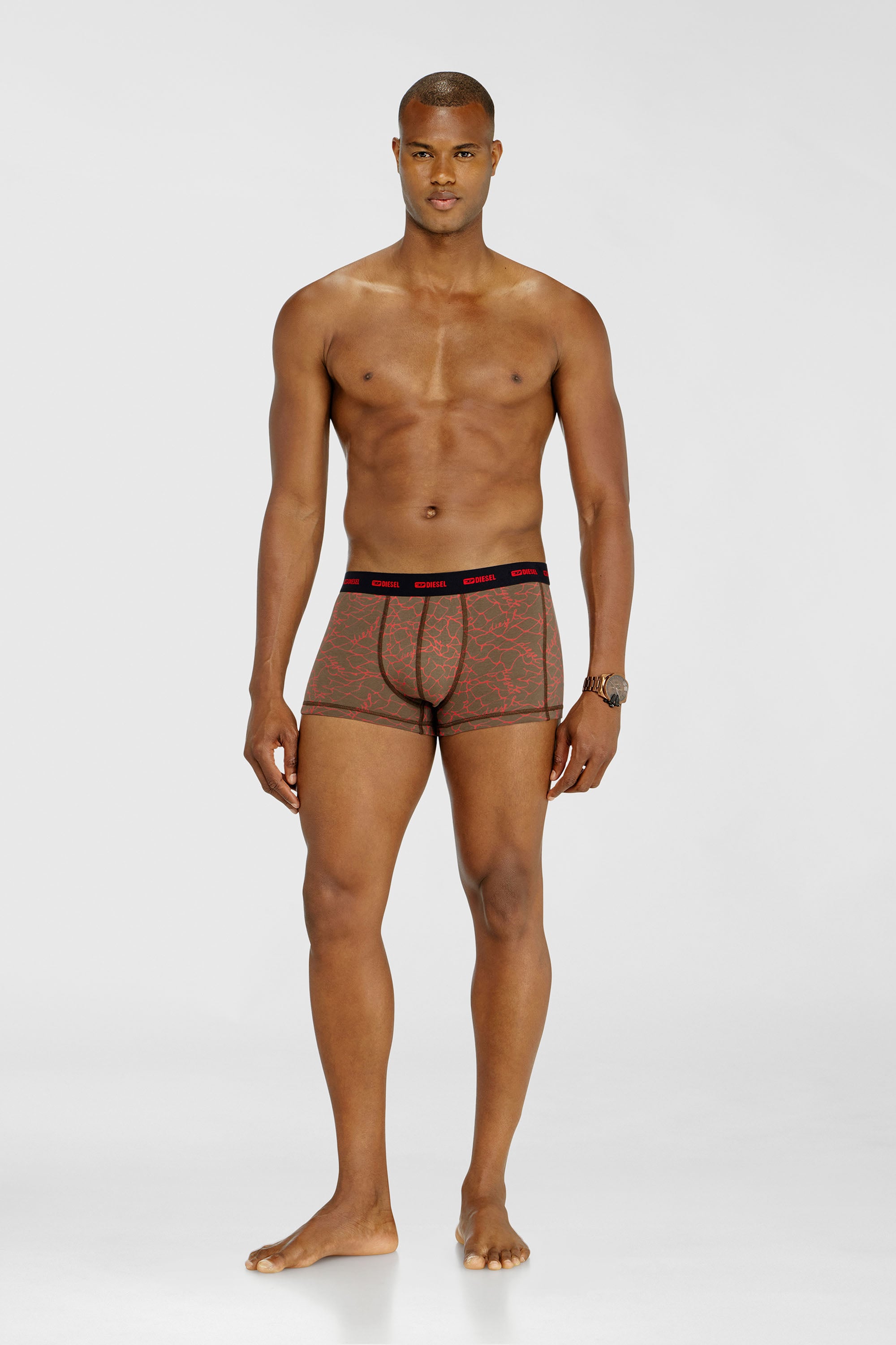 Diesel - DAMIEN-UTLT-3PACK, Herren Dreierpack Trunks mit grafischem Motiv in Schwarz/Braun - 2