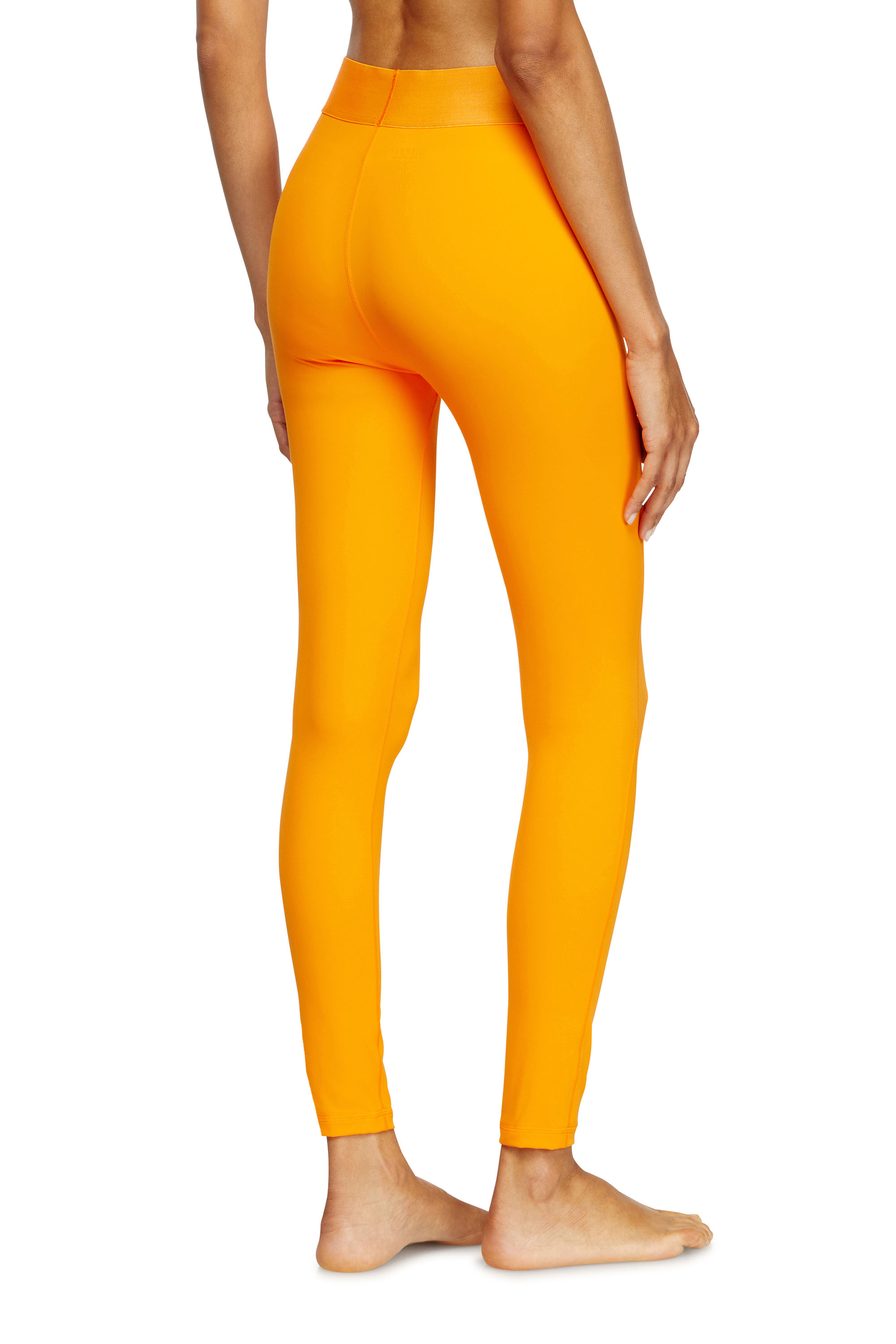 Diesel - ADELINE-D-POP, Damen Leggings aus Mikrofaser mit Cut-off-Logo in Orange - 4