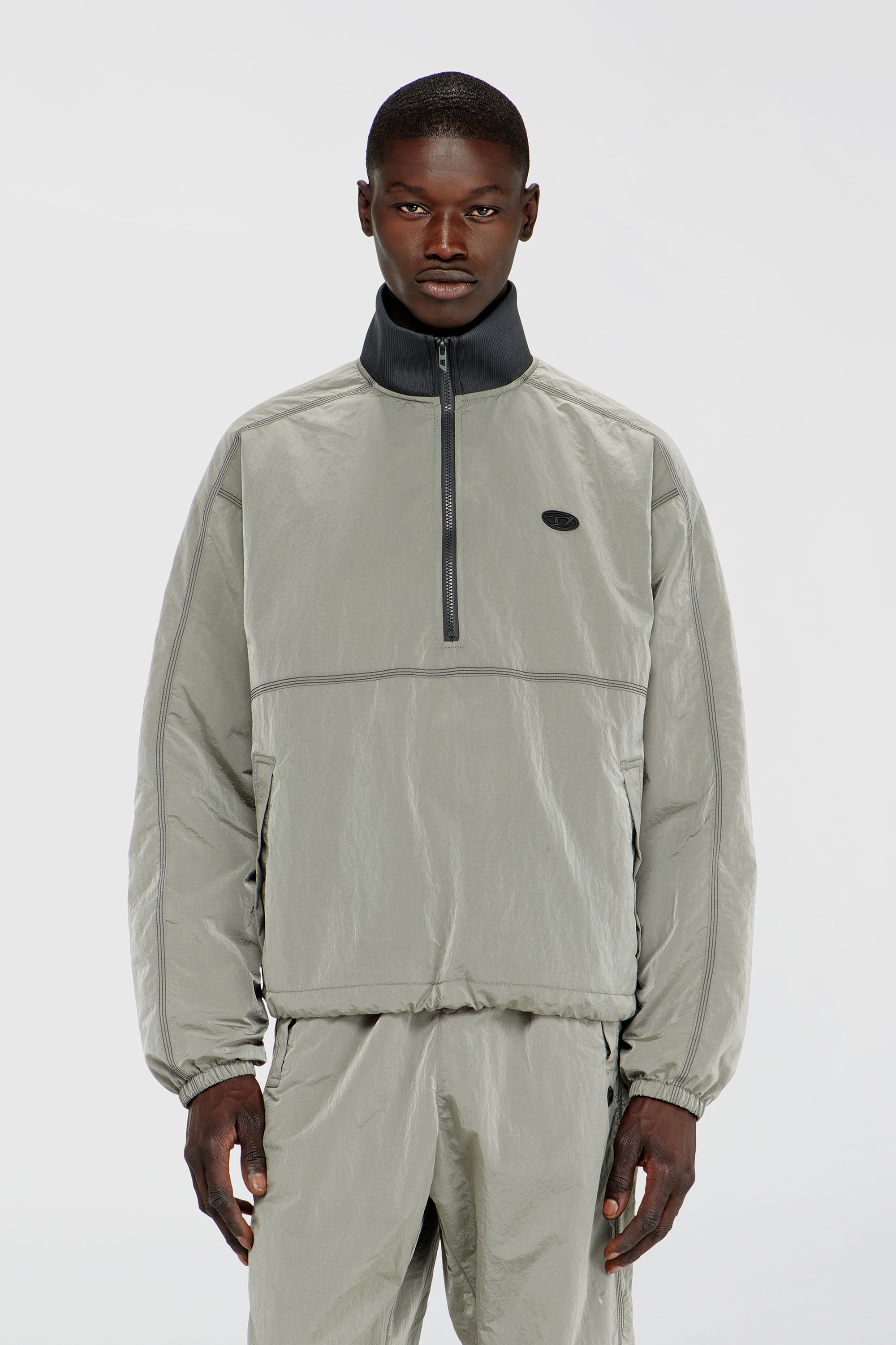 Diesel - J-ANOK, Herren Nylonjacke mit Crinkle-Effekt in Hellgrau - 1