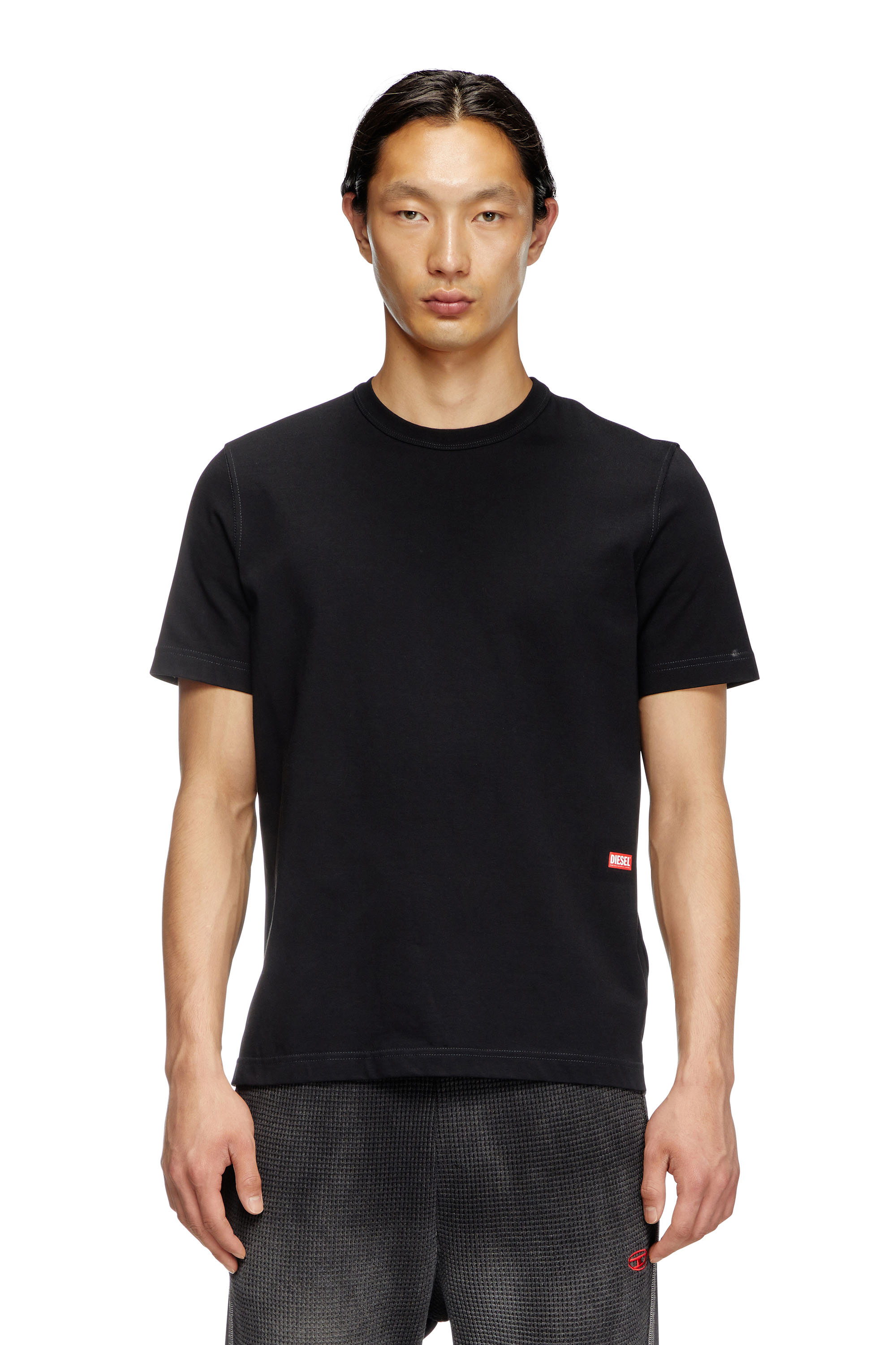 Diesel - T-ADJUST-SLITS-R13, Man's T-shirt with runway set print in Black - 1