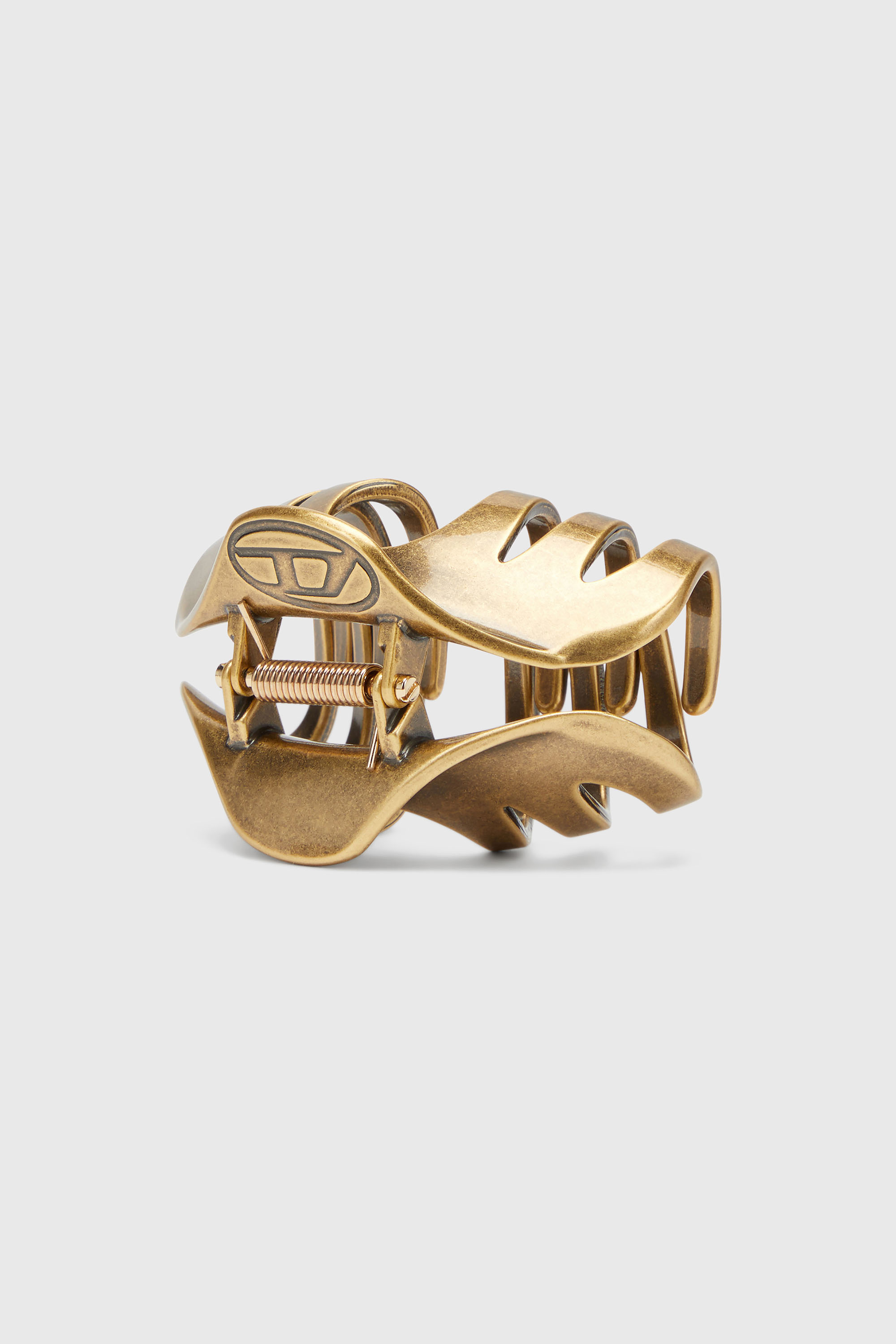 Metal claw hair clip

Metall-Haarspange mit Kralle
