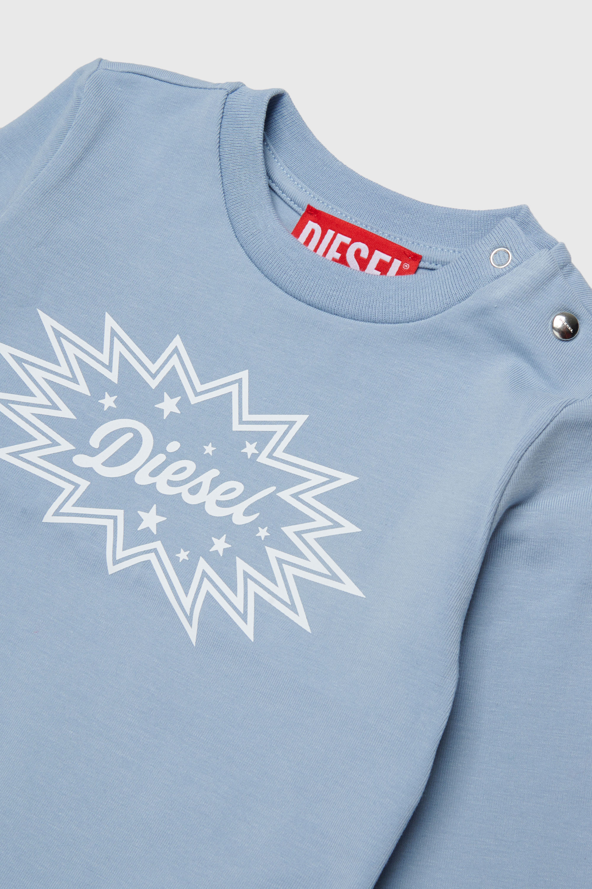 Diesel - TFUMB, Damen Langarm-T-Shirt mit starburst Logo-Print in Hellblau - 3