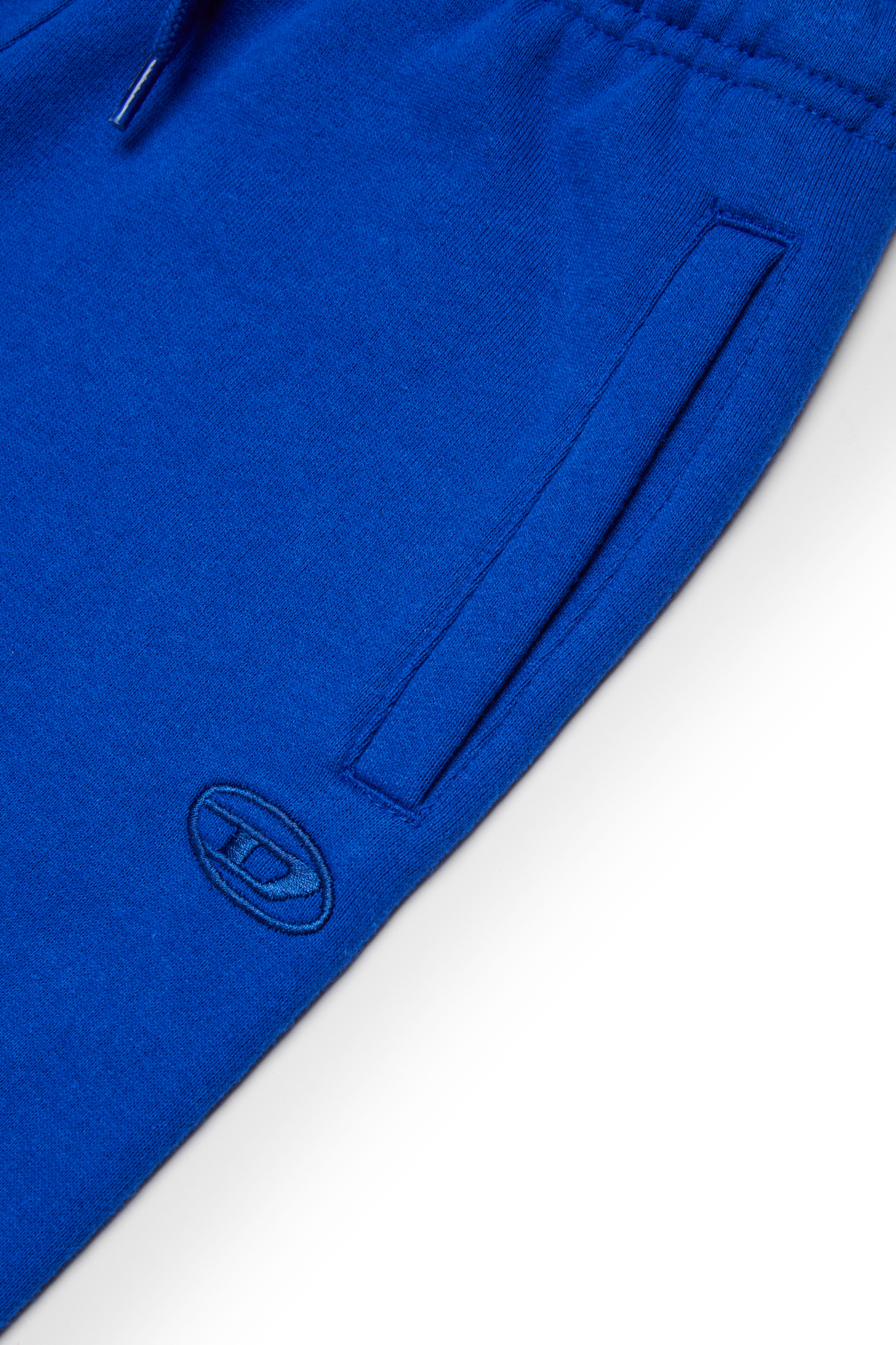 Diesel - PMARKYMEGOVALD, Herren Sweathose mit großer Oval D-Stickerei in Blau - 4